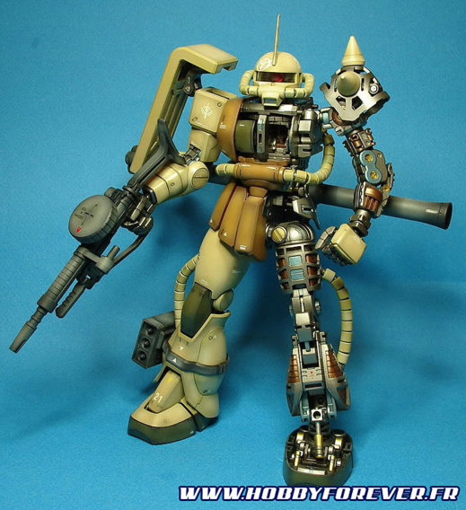 Toujours le MG MS-06J Zaku II ver.2.0 mais cette fois avec une peinture personnalisée (par Zenkuro) Toujours le MG MS-06J Zaku II ver.2.0 mais cette fois avec une peinture personnalisée (par Zenkuro)
