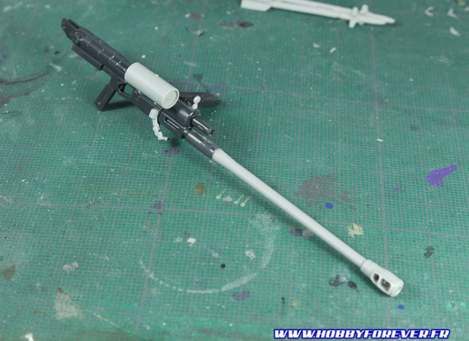 Le machine gun est modifié en canon à longue portée Le machine gun est modifié en canon à longue portée