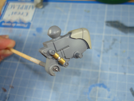 Le pied et ses pistons peints en Gold et Mithril Silver Le pied et ses pistons peints en Gold et Mithril Silver