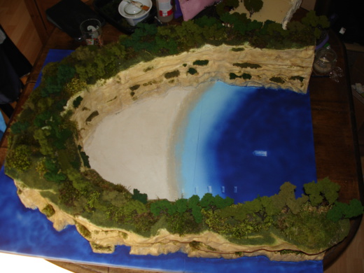 La plage : l'effet sable est fait avec de la pâte à bois, un dégradé est réalisé pour le rivage La plage : l'effet sable est fait avec de la pâte à bois, un dégradé est réalisé pour le rivage